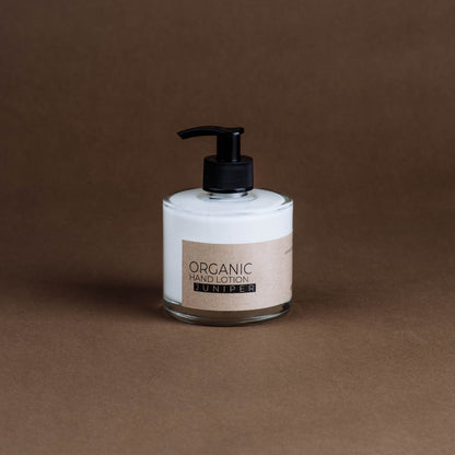 Juniper organic hand lotion in glass bottle