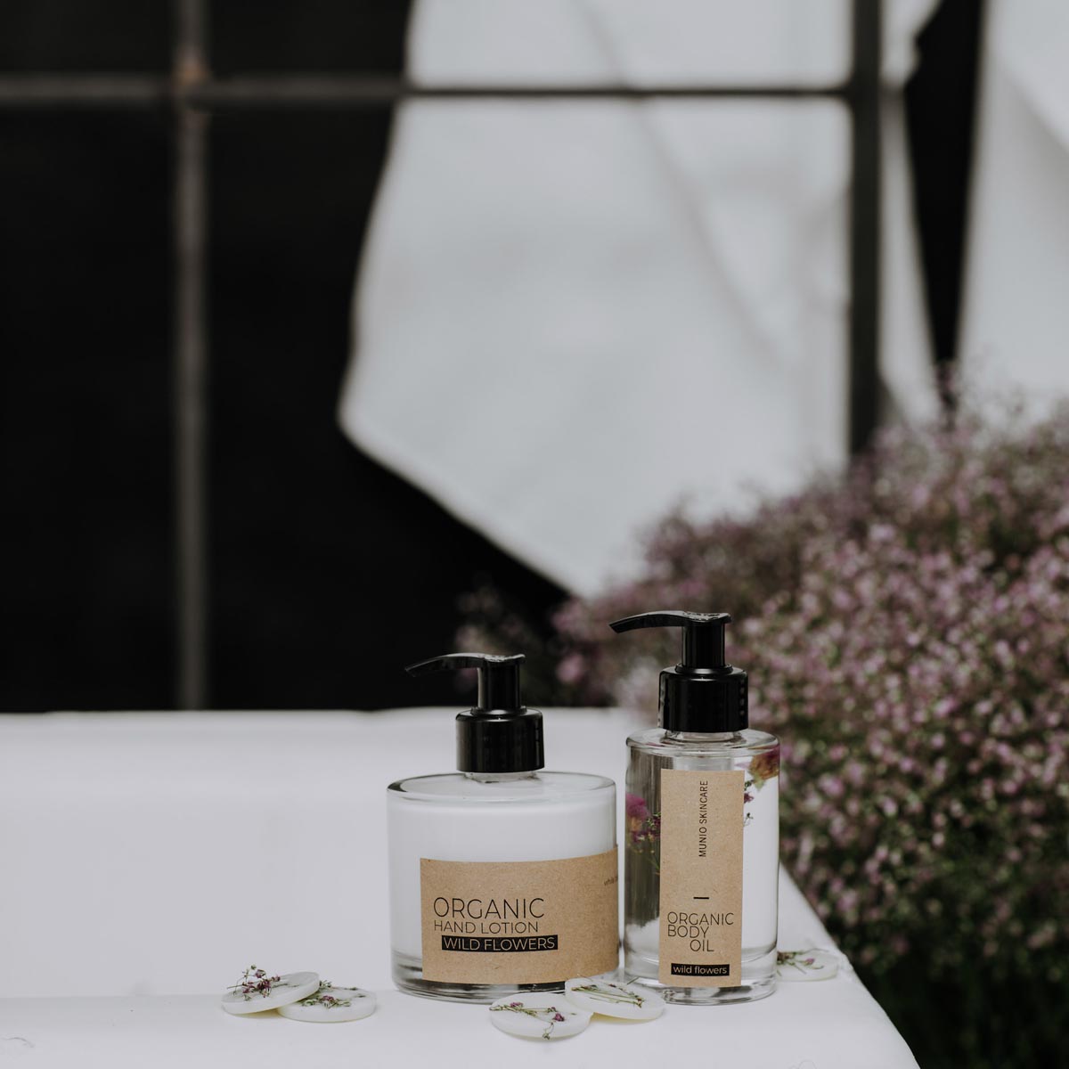 Wild flowers organic hand lotion in glass bottle