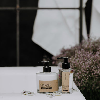 Wild flowers organic hand lotion in glass bottle