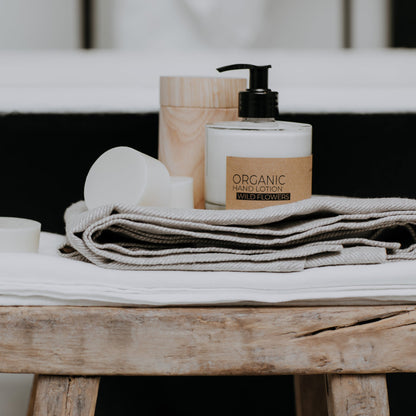 Wild flowers organic hand lotion in glass bottle