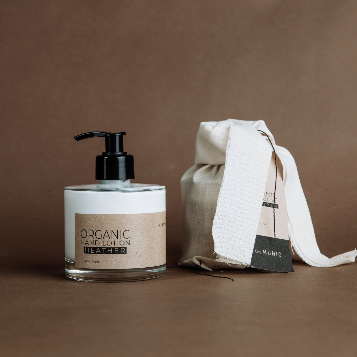 Heather organic hand lotion in glass bottle