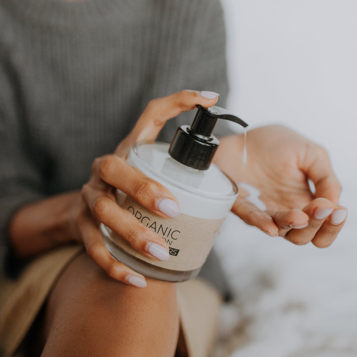 Wild flowers organic hand lotion in glass bottle